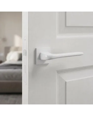 La poignée de porte en solo de couleur blanche
