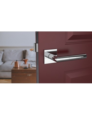 Poignée de porte chrome poli ARABIS poignée design montée sur une porte