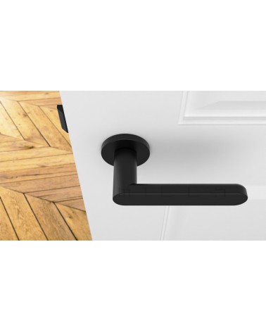 Poignée de porte Moderne ALORA poignée design vue de haut montée sur une porte
