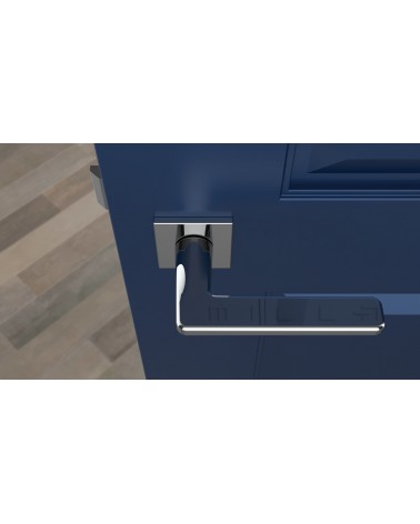 Poignée de porte Contemporain SETIA  quincaillerie design vue de haut montée sur une porte