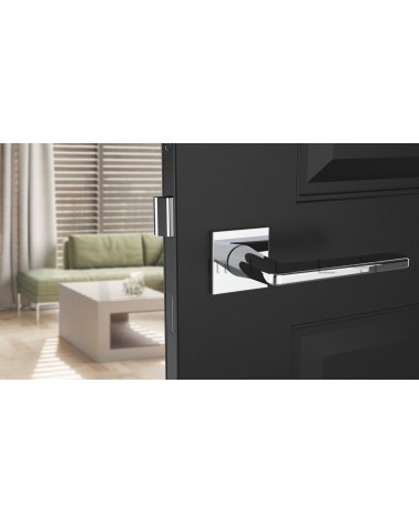 Poignée de porte Contemporain SETIA  quincaillerie design vue de face montée sur une porte