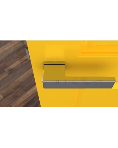 Poignée de porte chrome poli CARLINA poignée design vue de haut montée sur une porte