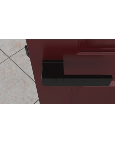 Poignée de porte noire CARLINA poignée design vue de haut montée sur une porte