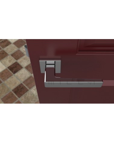 Poignée de porte chrome poli ERICA quincaillerie design vue de haut montée sur une porte
