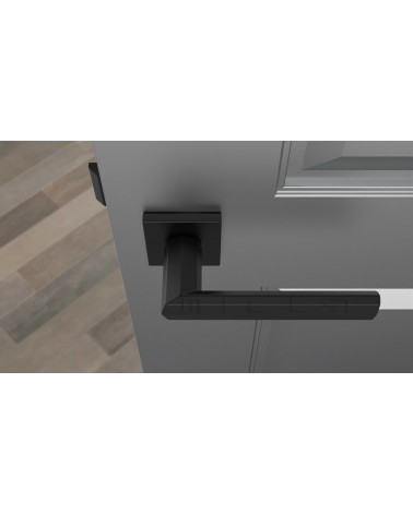 Poignée de porte moderne FRESIA poignée design vue de haut montée sur une porte