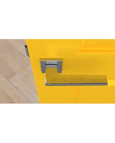 Poignée de porte chrome poli LUNARIA poignée design vue de haut montée sur une porte