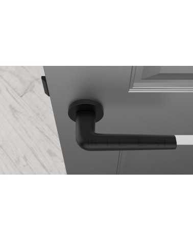 Poignée de porte Moderne FUNKIA poignée design vue de haut montée sur une porte