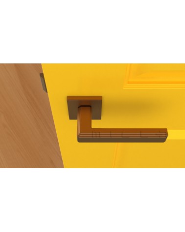 Poignée de porte moderne RAFLESIA poignée design de couleur 1 montée sur une porte jaune