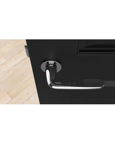 Poignée de porte chrome poli HIACYNTA poignée design vue de haut montée sur une porte
