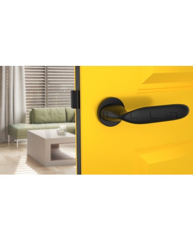Poignée de porte futuriste PEONIA poignée design vue de face montée sur une porte