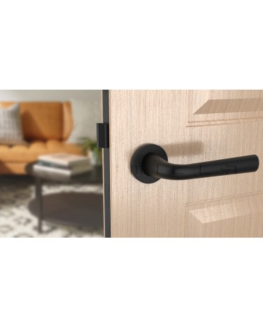 Poignée de porte Noire TULIPA porte intérieure design vue de face montée sur une porte