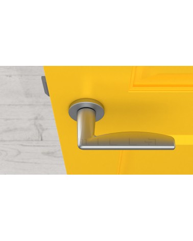 Poignée de porte chrome satiné LUNA poignée design vue de haut montée sur porte