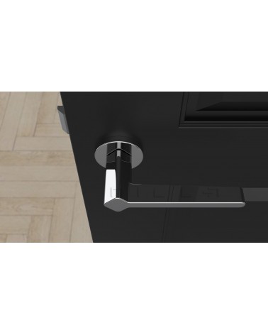 Poignée de porte style futuriste NINFEA quincaillerie design vue de haut montée sur une porte