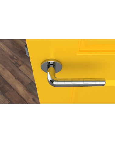 Poignée de porte Classique INULLA poignée design vue de haut montée sur une porte
