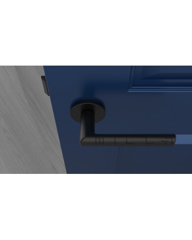 Poignée de porte noire SILENA quincaillerie design vue de haut montée sur une porte
