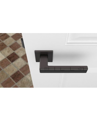 Poignée de porte Classique TILLIA poignée design couleur 2 vue de haut montée sur une porte