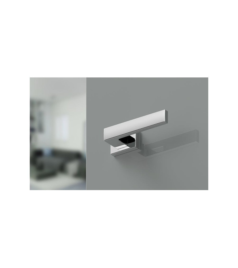poigne rectangulaire de couleur chrome poli sur une porte d'un bureau