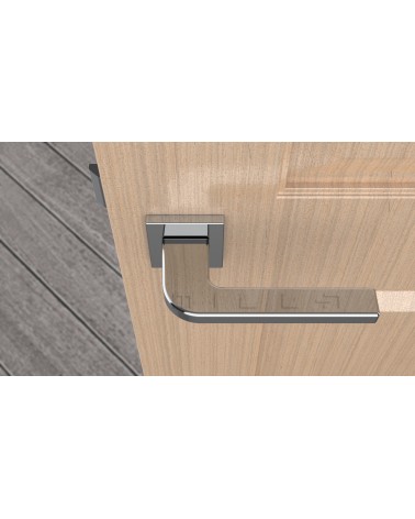 Poignée de porte chrome poli ISMENA poignée design vue de haut montée sur une porte