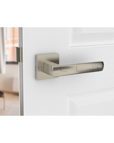 Poignée de porte moderne DIUNA poignée designn montée sur une porte entrouverte