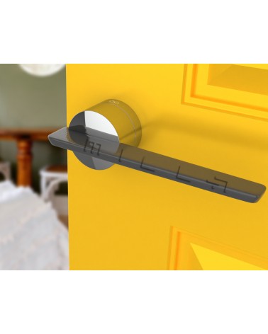 Poignée de porte bicolore JUMELLE poignée design vue inclinée montée sur une porte
