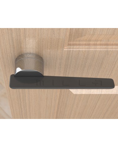 Poignée de porte bicolore JUMELLE poignée design vue de haut montée sur une porte