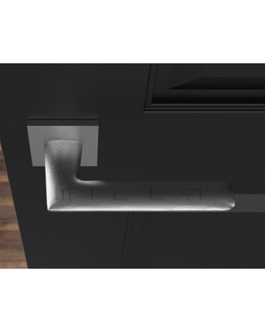 Poignée de porte chrome poli Line GIULIA poignée design vue de haut montée sur une porte