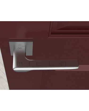 Poignée de porte moderne LIGNE poignée design vue de haut montée sur une porte