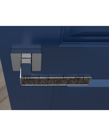 Poignée de porte chrome poli GLAMOUR quincaillerie design vue de haut montée sur une porte