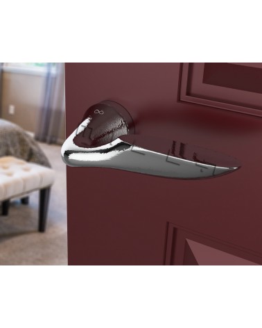 Poignée de porte futuriste DOUCE poignée design vue de face montée sur une porte