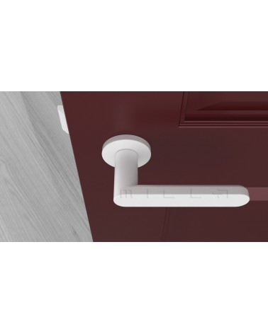 Poignée de porte sur plaque ronde ALORA poignée design couleur 5 vue de haut montée sur une porte