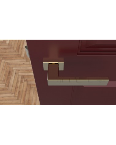 Poignée de porte matière zamak PINA poignée design vue de haut montée sur une porte