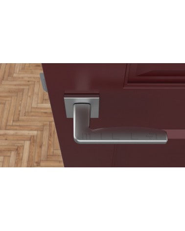 Poignée de porte en zamak ERBA poignée design couleur 2 vue de haut montée sur une porte