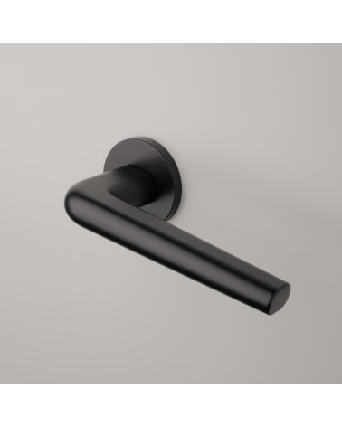 Poignée de porte en zamak FUNKIA poignée design montée sur une porte