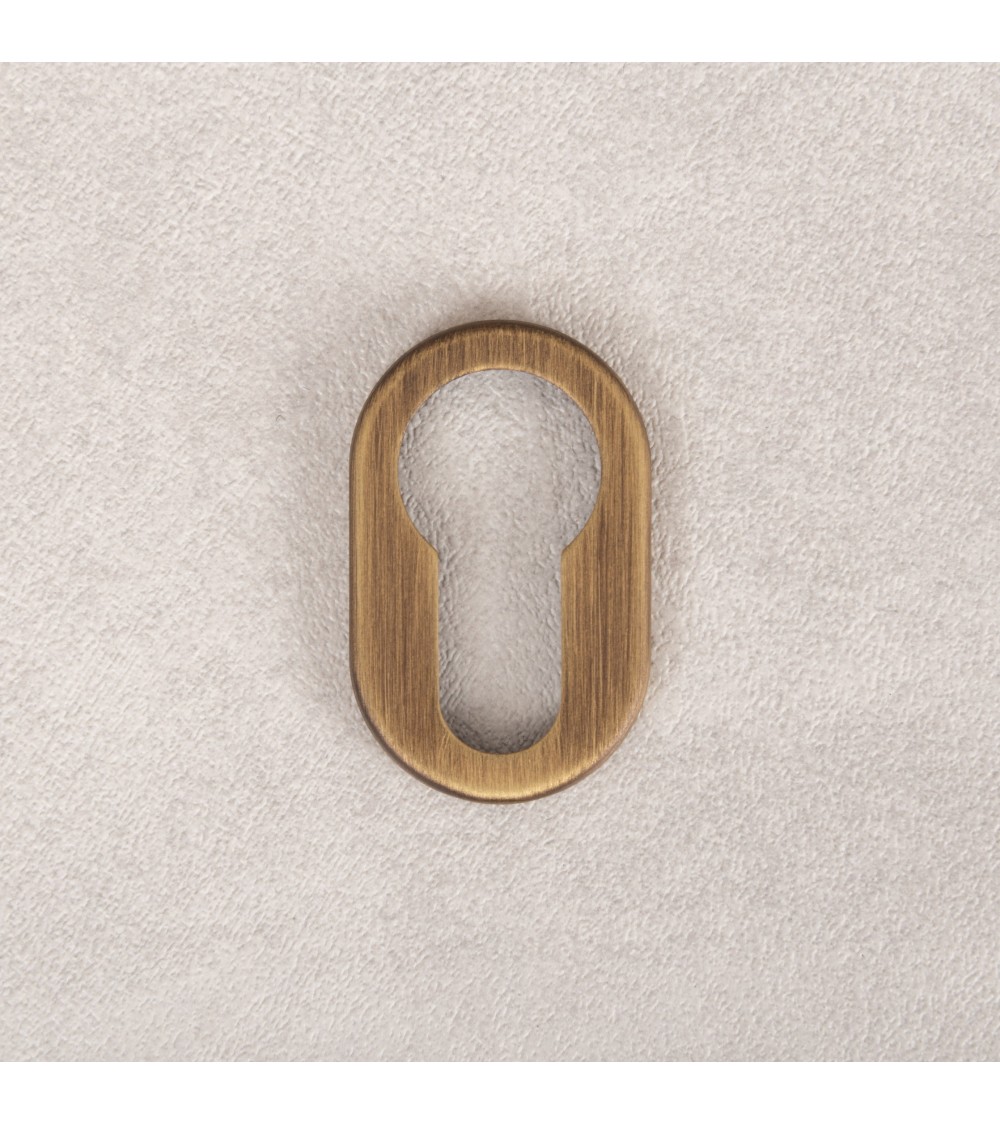 rosace de porte ovale à clé de style minimaliste