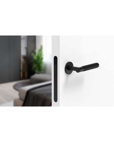 Poignée de porte noire Time Slim poignée design montée sur une porte