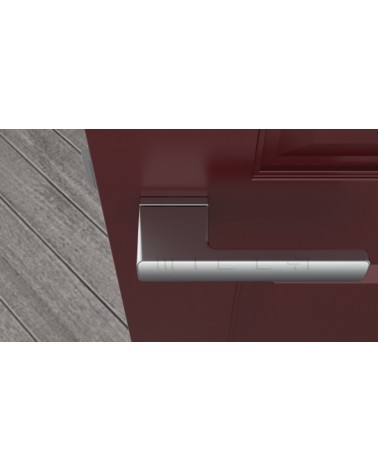 Poignée de porte chrome satiné BRISA poignée design montée sur une porte vue de haut