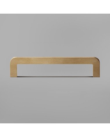 Poignée de meuble en laiton brossé ISA poignée design fixée sur une surface