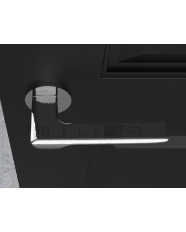 Poignée de porte zamak LIGNE quincaillerie design vue de haut montée sur une porte