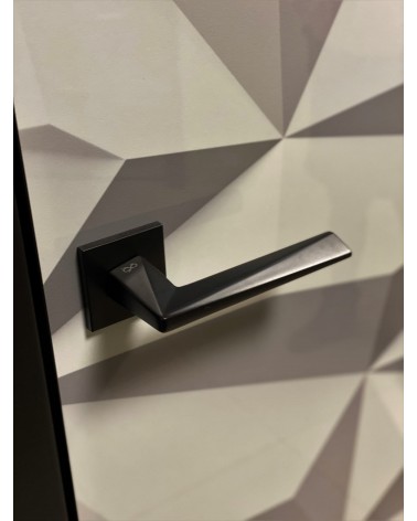 Poignée de porte zamak DIAMANT poignée design couleur 1 vue de haut légèrement inclinée