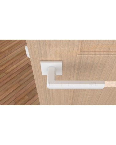 Poignée de porte HOSTA quincaillerie design couleur 5 vue de haut montée sur une porte