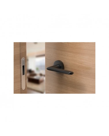 Poignée de porte noire Spark poignée design vue de haut montée sur une porte