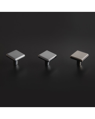 Bouton de meuble titane NOX poignée design disposé sur un fond sombre
