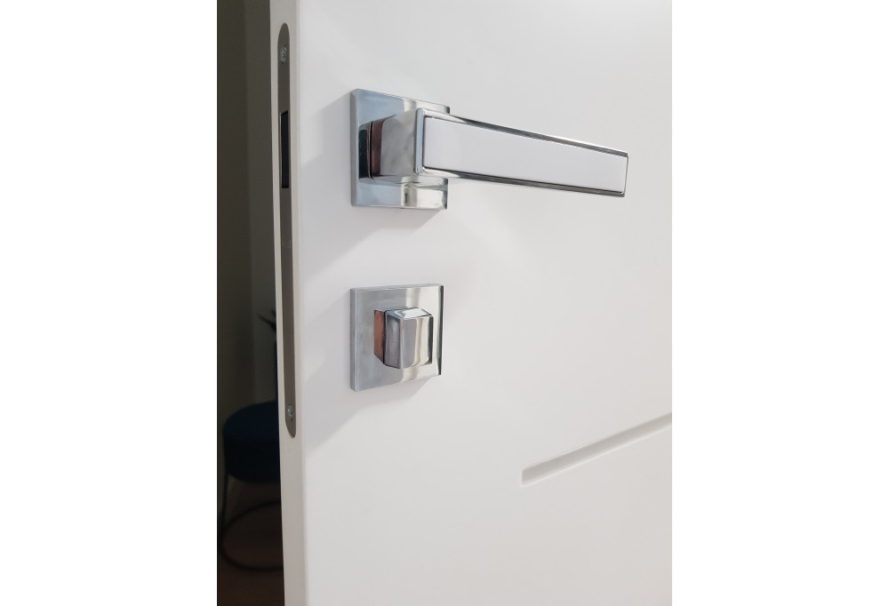 Qu'est-ce qu'une poignée de porte montée sur rosace?